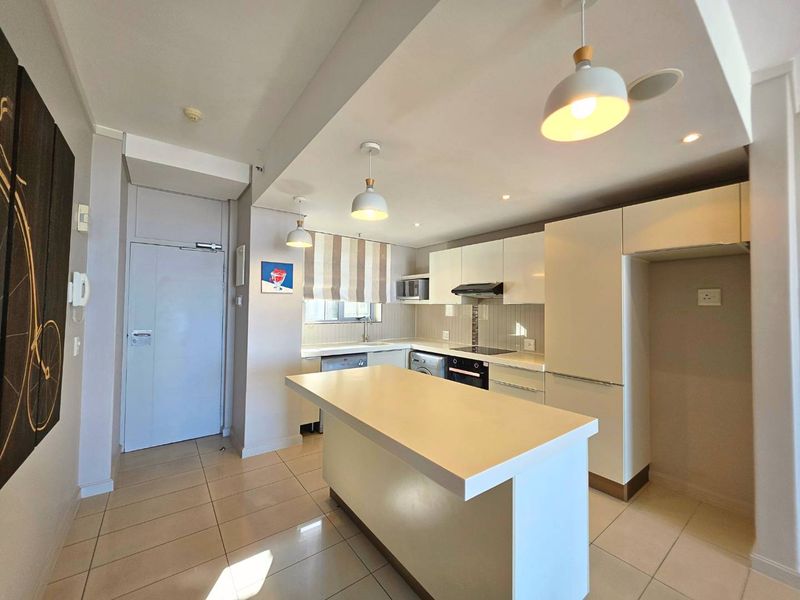 Top Floor 2 Bedroom Apartment in Montclare Place - Photo 2