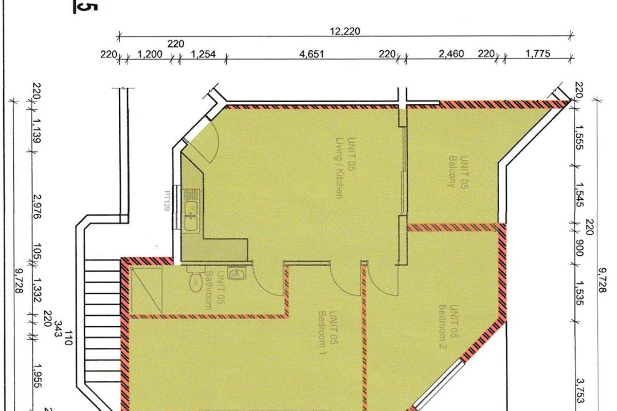 Architectural floor plan for Unit 05, showing a two-bedroom apartment layout with an open-plan living area, kitchen, bathroom, and balcony.