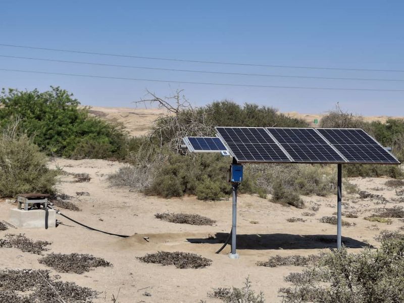 A solar-powered borehole pump installation located on the small holding, providing sustainable water supply infrastructure.