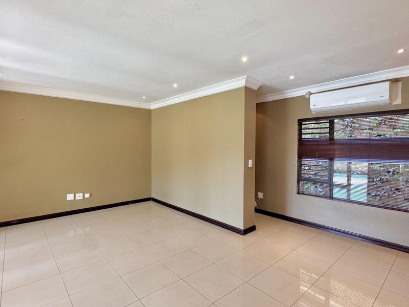 This spacious freestanding townhouse offers comfortable family living with excellent security and stylish finishes throughout. - Photo 7