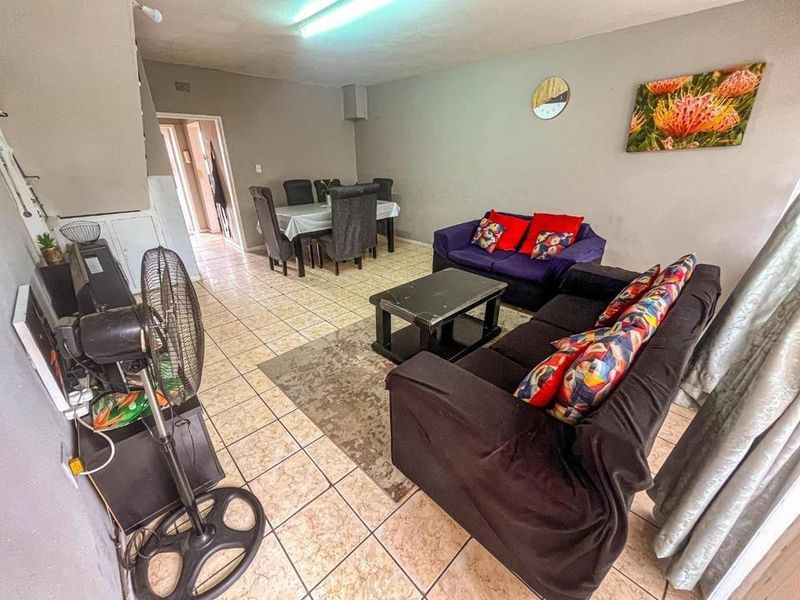 Experience Secure Modern Comfort in This Expansive Towerby Duplex - Photo 2