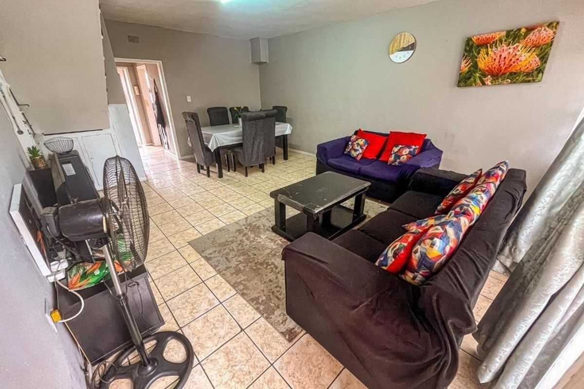 Experience Secure Modern Comfort in This Expansive Towerby Duplex - Photo 2