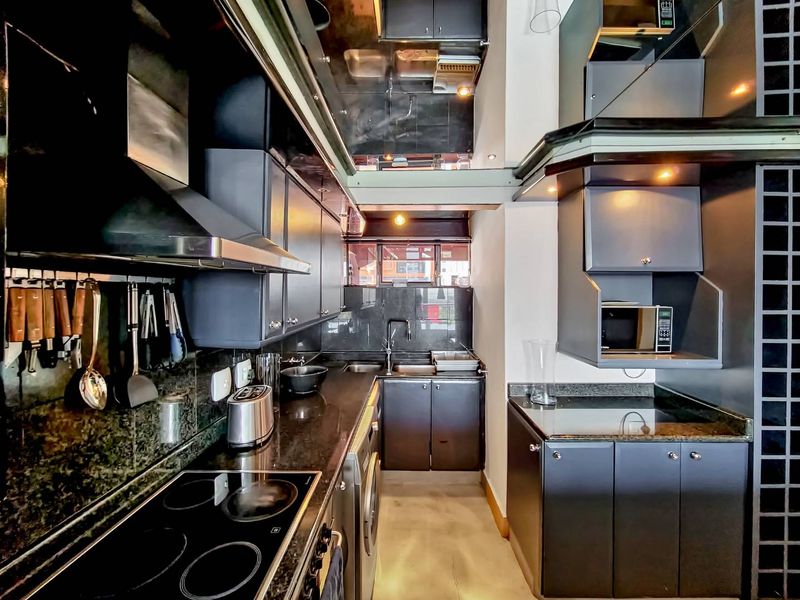 Entertain in Style: Spacious Penthouse with Pool & Views - Photo 8