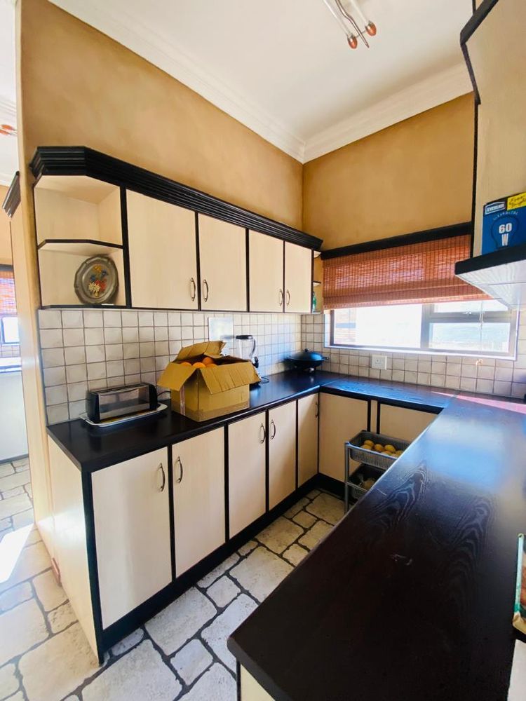 Kitchen with buil-in cupboards