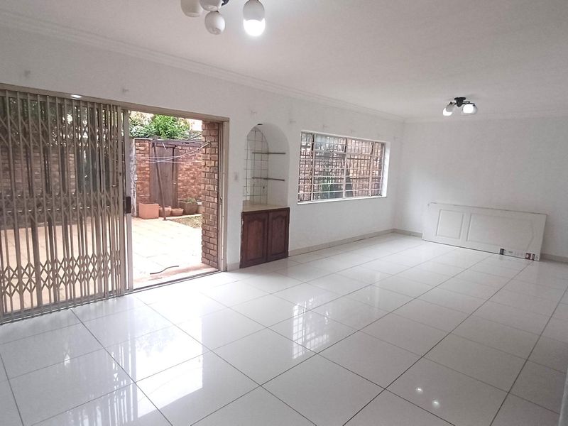 Spacious, Affordable Double-Storey Living with Patio & Pool - Photo 7