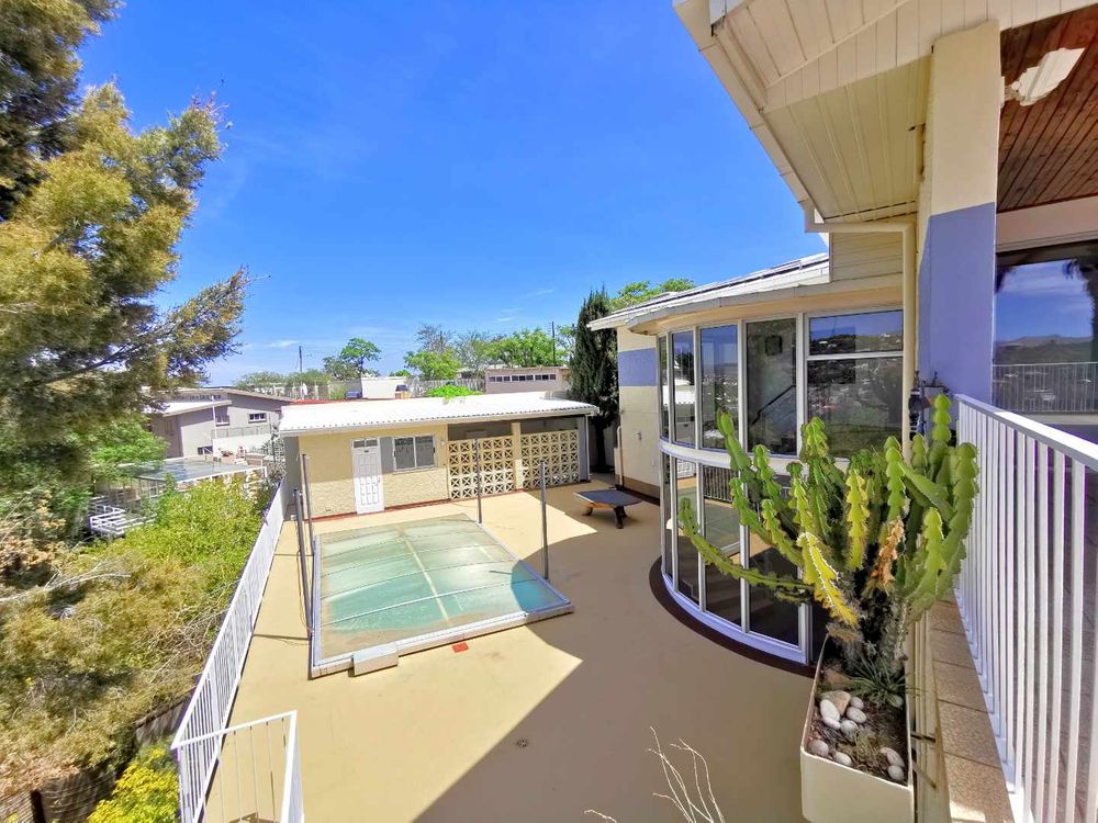 VIEW DOWN FROM THE 2ST FLOOR VERANDA 