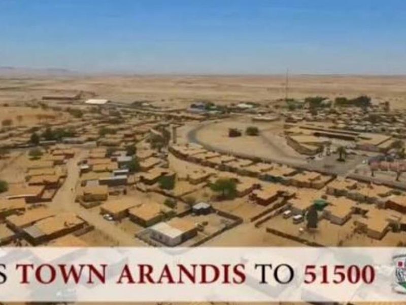 An aerial view of the town of Arandis, showcasing the surrounding landscape and residential layout.