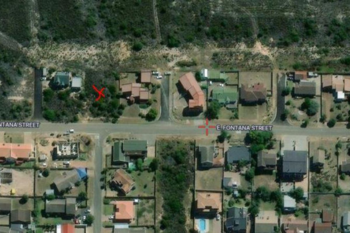 Aerial view of a residential vacant land plot located on E. Fontana Street, surrounded by established neighborhood housing.