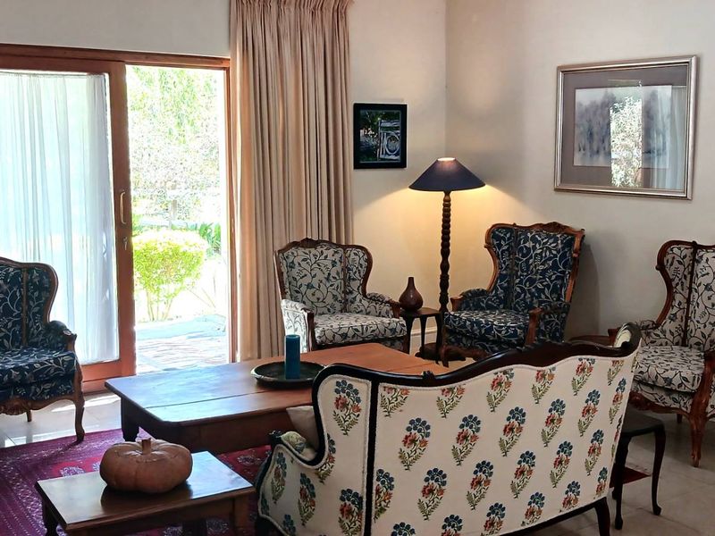 A tranquil setting complements this well established home - Photo 8