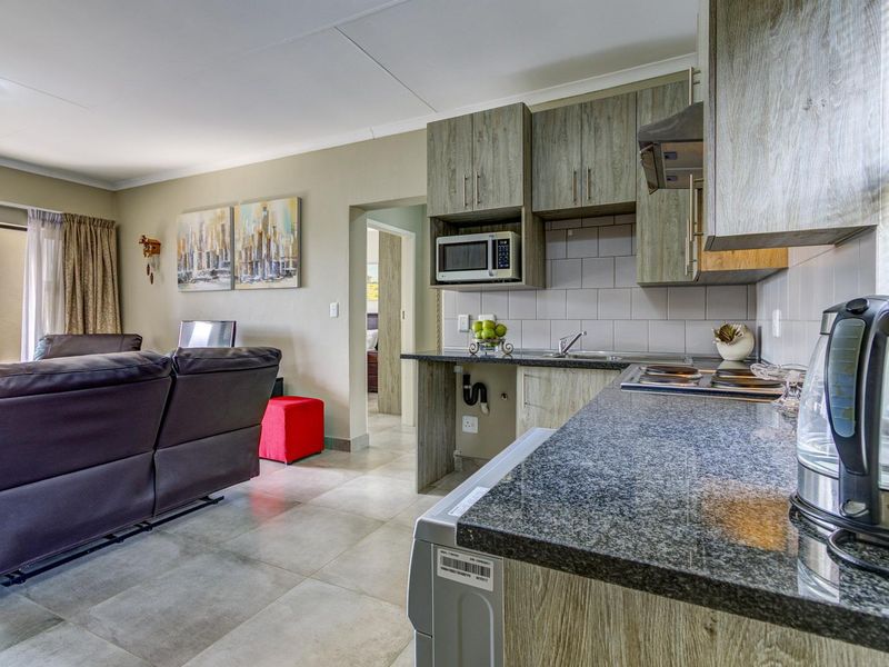 SUNNY, SECURE AND SPOTLESS UPSTAIRS UNIT - Photo 7