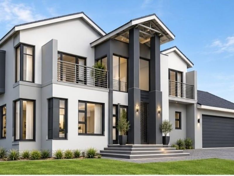 Modern double-story residential home featuring a contemporary facade, double garage, and upper-level balconies with clean architectural lines.