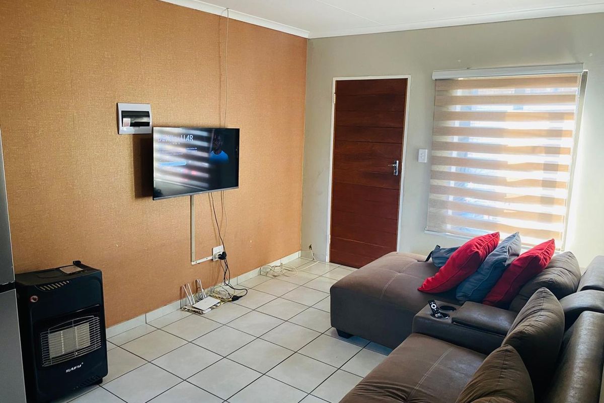 Discover Affordable, Secure and Comfortable living in Elandspoort!!! - Photo 4