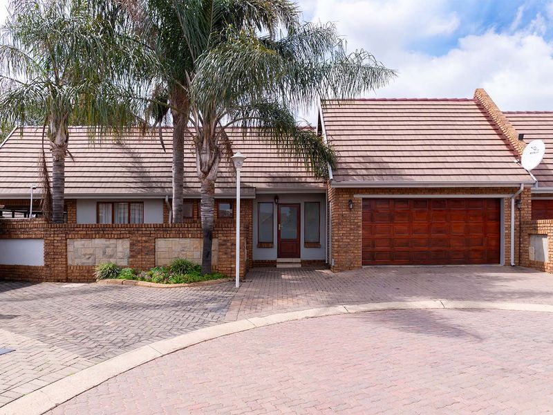 Lovely 3-bedroom facebrick home with a pool situated in a secure estate in Glen Marais - Photo 2