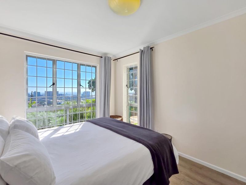 Tranquil City Views Await: Secure Two-Bedroom Apartment - Photo 9