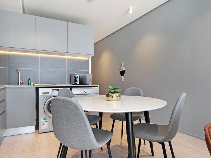 Experience City Living with a Serene Mountain Backdrop - Photo 10