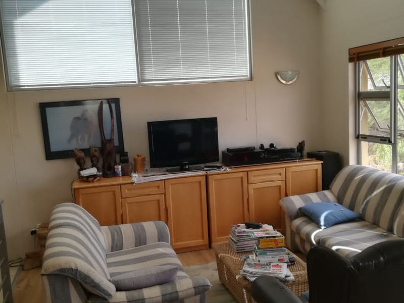 Charming 1-Bedroom Retreat: Comfort, Style & Security Await - Photo 6
