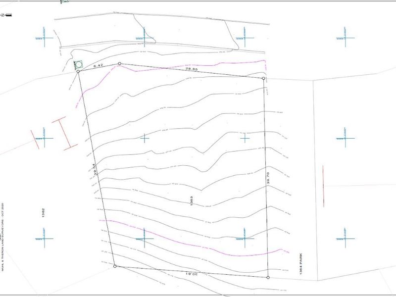 A topographical survey plan for Erf 1303 Montagu, detailing property boundaries, dimensions, and contour lines for the vacant residential land.