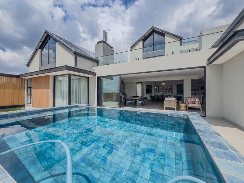 An Ultra-Modern Masterpiece Designed for Luxury Living - Photo 1