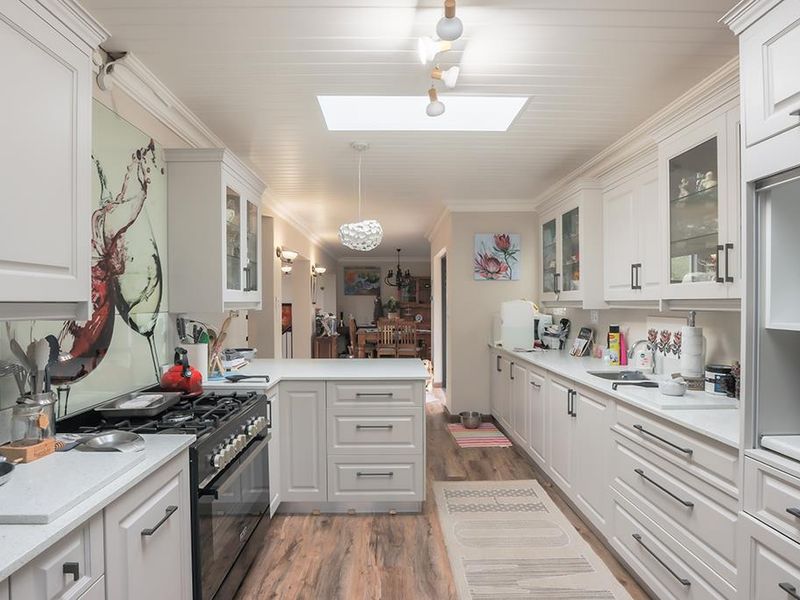 Stunning Family Home with Panoramic Mountain Views and Income-Generating Cottage - Photo 5