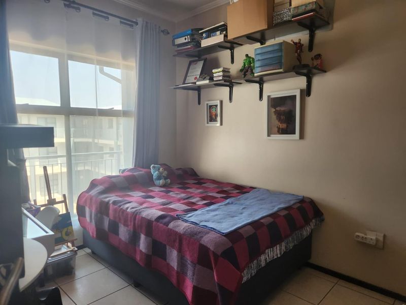 Charming North-Facing 2-Bedroom Unit in Modern Complex - Photo 9