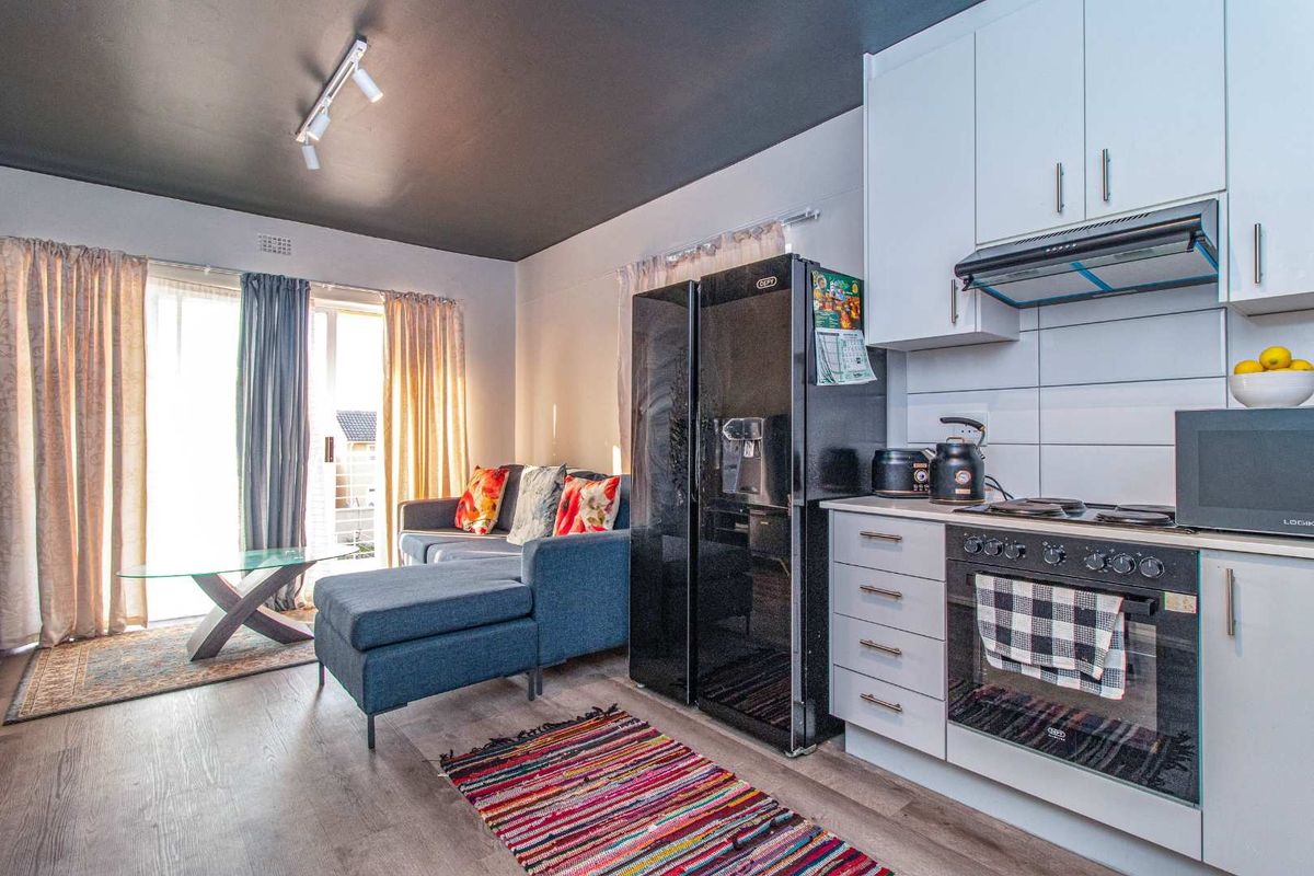 A modern two-bedroom apartment where comfort, convenience, and natural beauty come together. - Photo 2