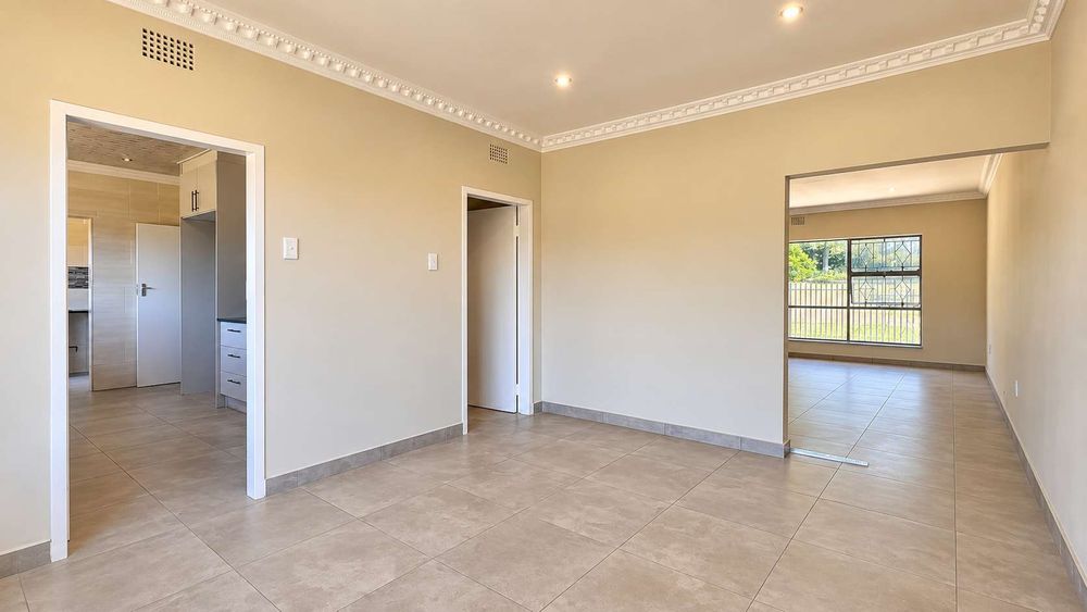 Dining room with kitchen to left 