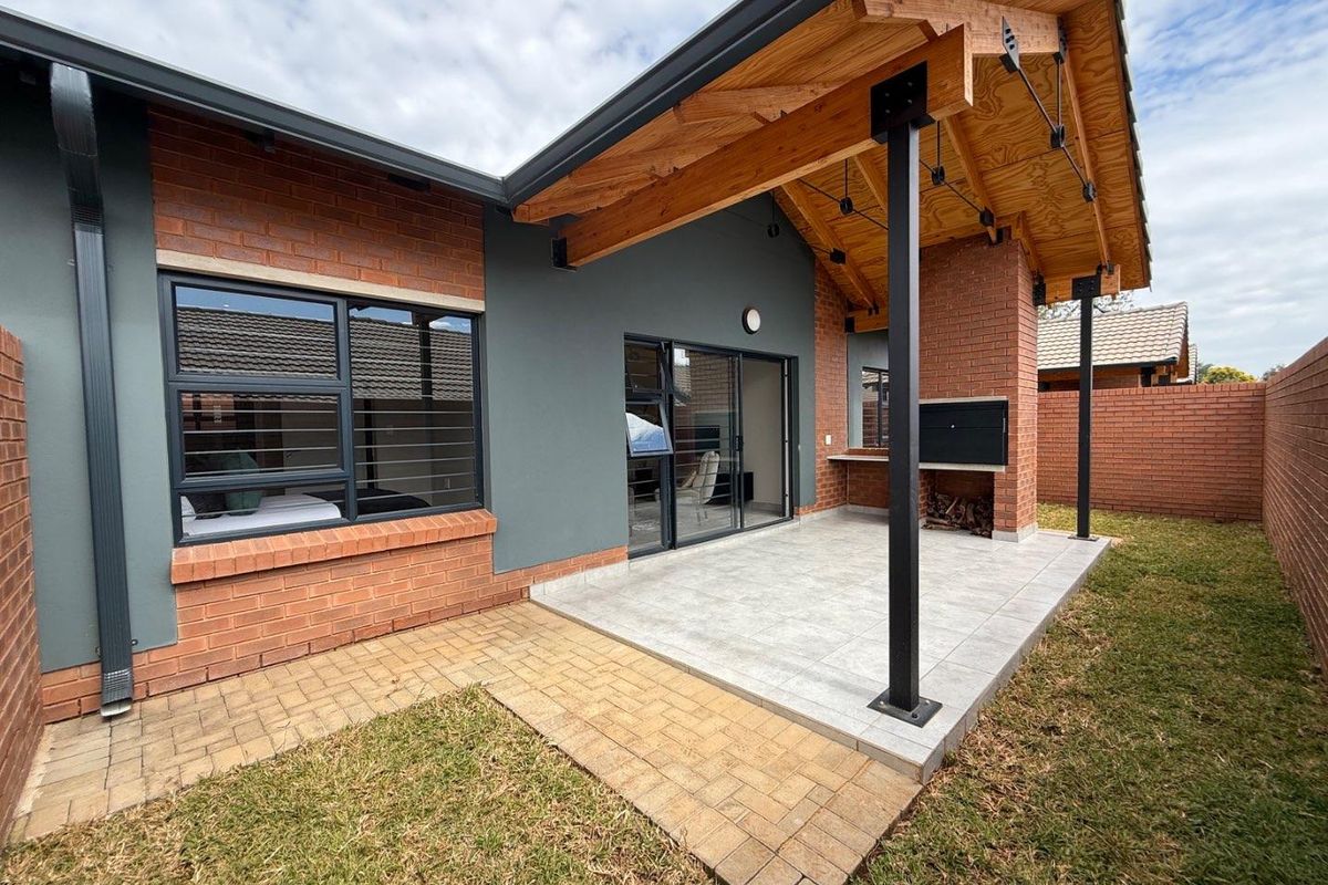 Sophisticated 3-Bedroom Simplex with Double Garage and Private Garden Sanctuary - Photo 2