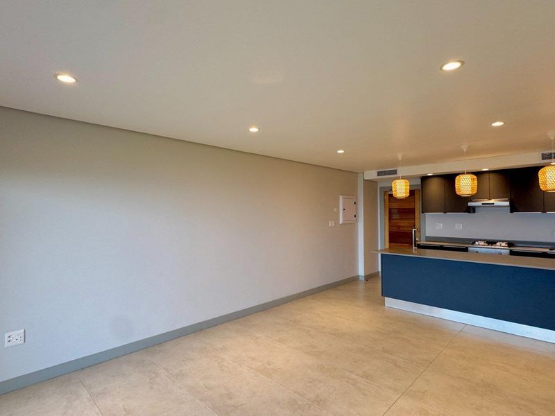This is a premium, move-in-ready coastal apartment that combines luxury, security, and modern convenience in a sleek, never-before-lived-in space. - Photo 2