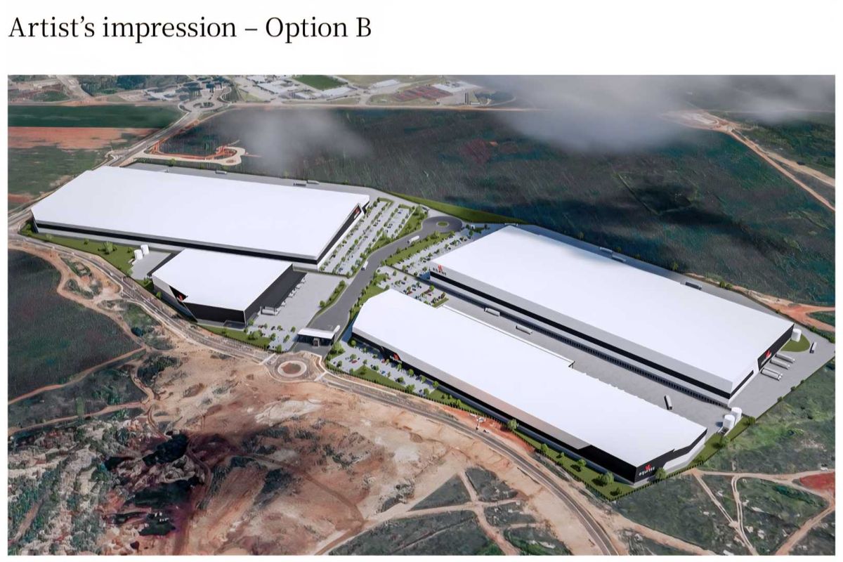 An aerial 3D architectural rendering of a proposed industrial park development featuring multiple large warehouse facilities, parking areas, and site access roads.
