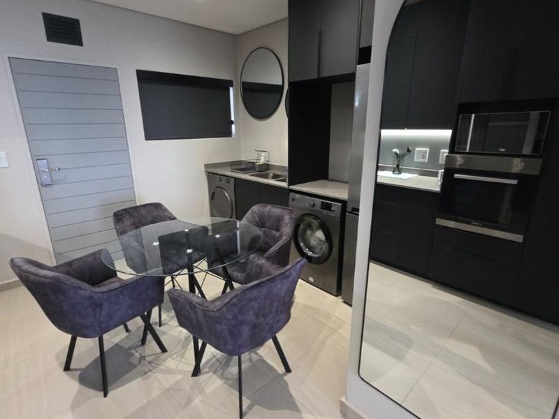 INCREDIBLE FULLY FURNISHED ULTRA MODERN STUDIO APARTMRNT IN SANDTON - Photo 8
