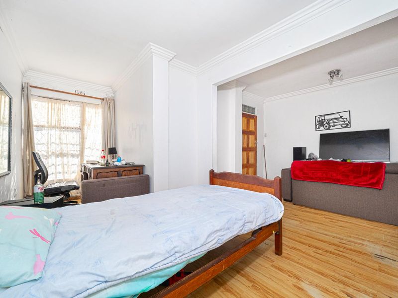 This Versatile Double-Storey property offers the perfect opportunity for renovation and customization with independent Upper and Lower Living (Homes) - Photo 6