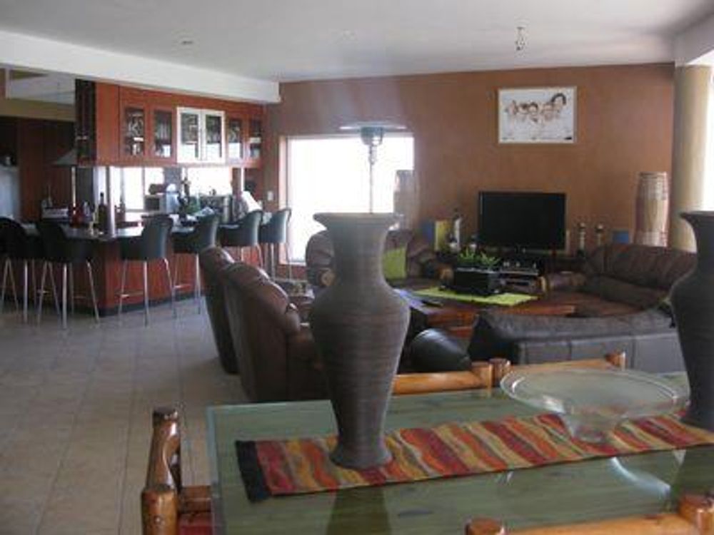 View of the open plan kitchen, dining and living area