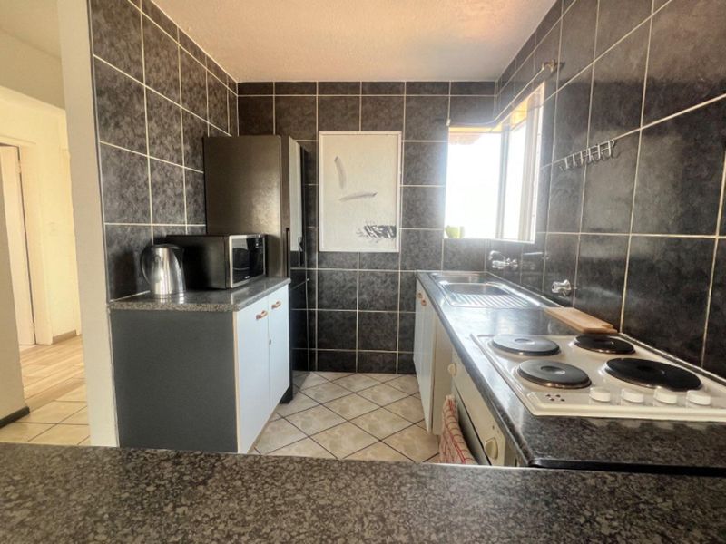 Your Perfect 2-Bedroom Retreat Awaits with Pool Access!" - Photo 4