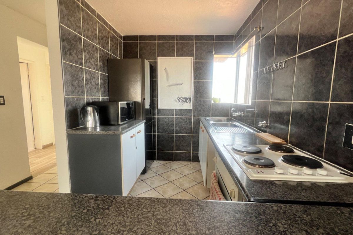 Your Perfect 2-Bedroom Retreat Awaits with Pool Access!" - Photo 4