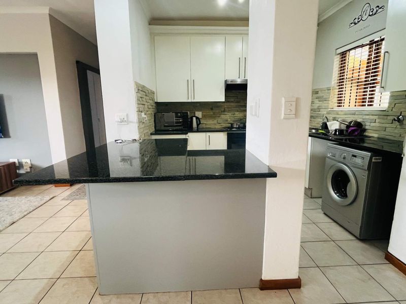 Charming Townhouse in Secure Sandton Village Estate, Paulshof - Photo 9