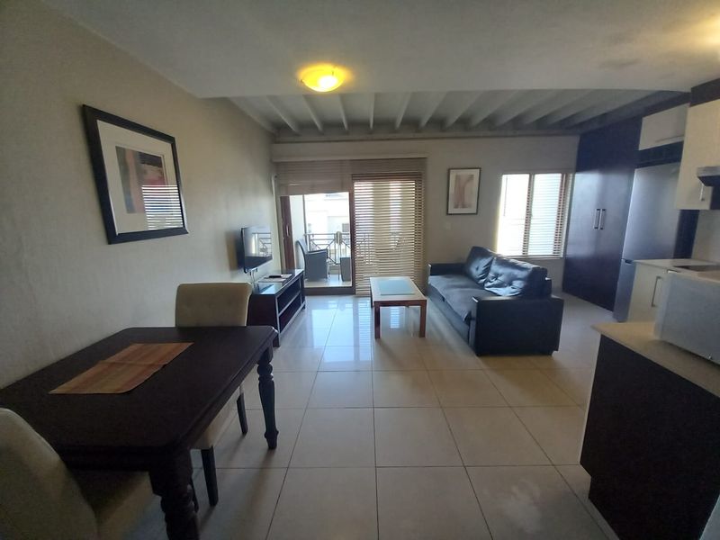 A CHARMING FURNISHED ONE BEDROOM APARTMENT - Photo 2