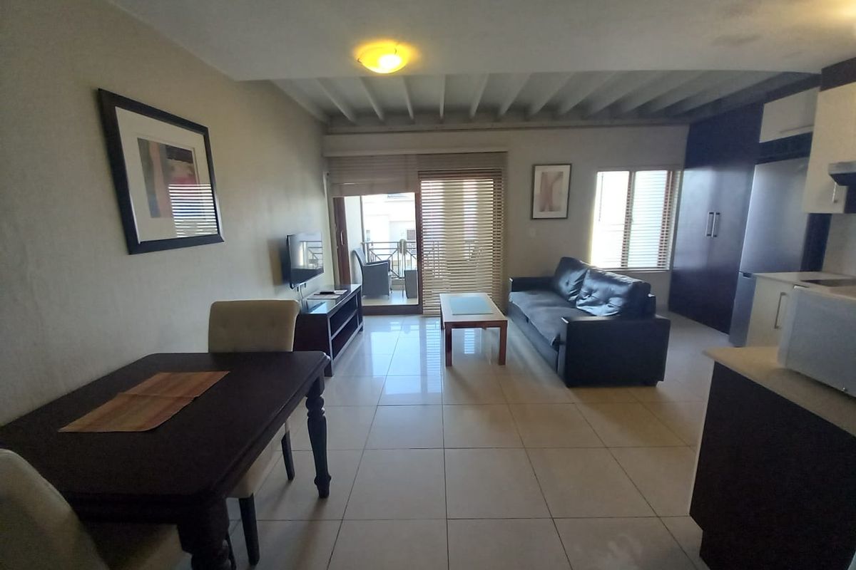 A CHARMING FURNISHED ONE BEDROOM APARTMENT - Photo 2