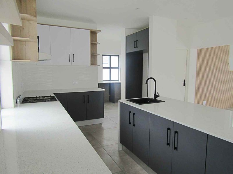 Costal three bedroom home with modern finishes - Photo 6