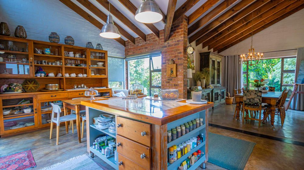 Farm Style kitchen with separate scullery and pantry, interesting cupboard space and  high volume roof structure