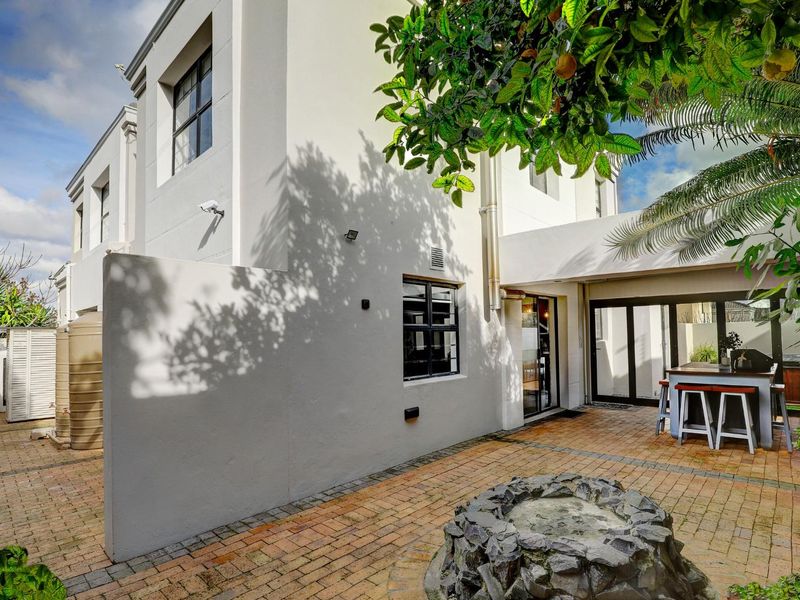 An exceptional opportunity to own a beautiful, modern home offering secure, stylish living in a sought-after, well-managed security estate! - Photo 4