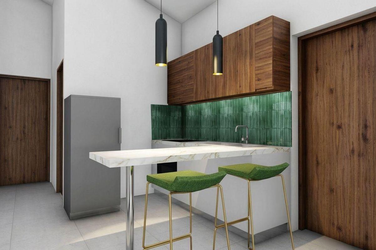 Modern kitchen featuring wood-grain cabinetry, a striking green tiled backsplash, marble-look breakfast bar, and contemporary pendant lighting.