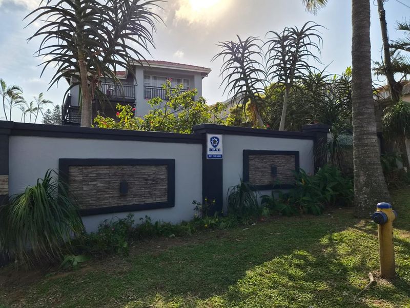 Spacious three-bedroom family home in Bluff featuring a swimming pool, lapa, and scenic garden views. Includes flatlet - Photo 1