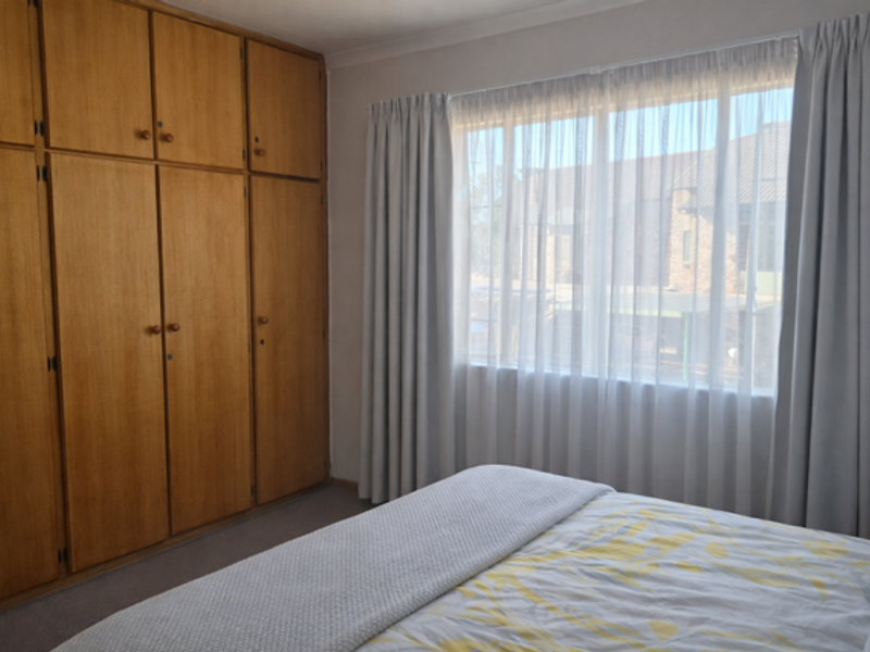 Neat & Move-In Ready 2-Bedroom Apartment in Secure Complex - Photo 7