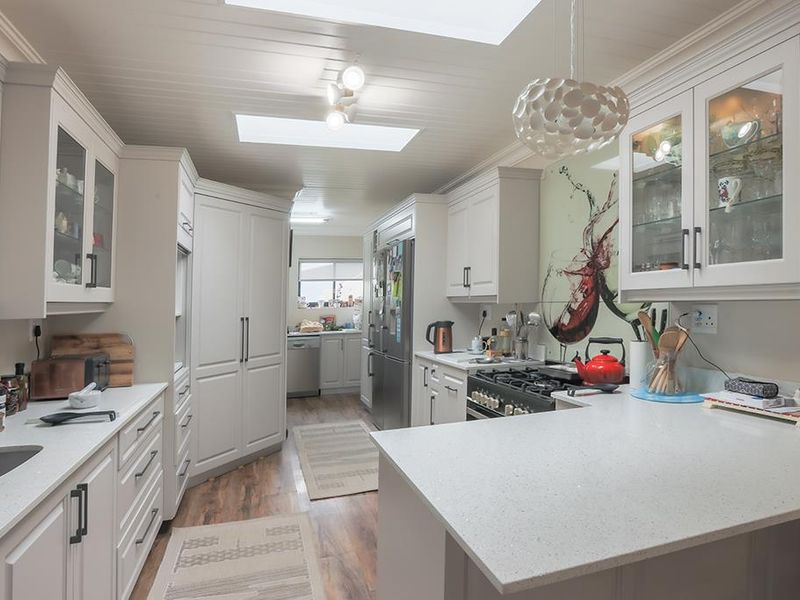 Stunning Family Home with Panoramic Mountain Views and Income-Generating Cottage - Photo 4