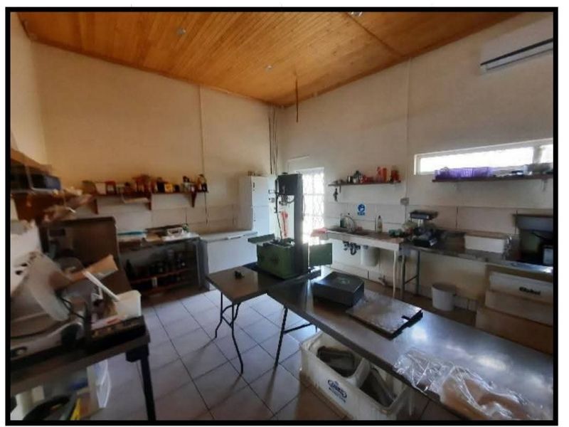 This exceptional property offers a unique blend of residential comfort, business potential, prime location close to town - Photo 6