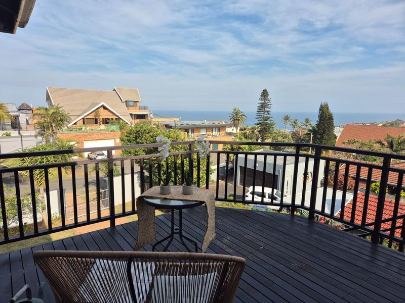 Spacious three-bedroom family home in Bluff featuring a swimming pool, lapa, and scenic garden views. Includes flatlet - Photo 3