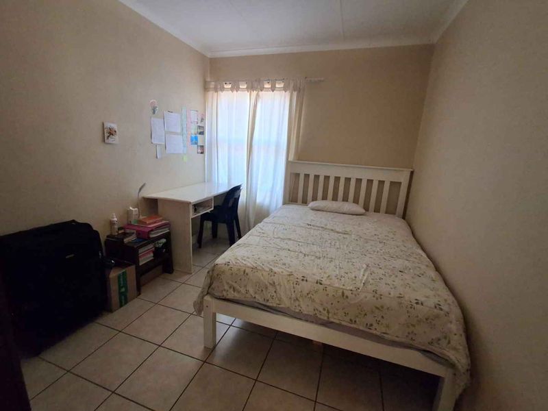 Convenient Location Meets Comfort in This 3-Bedroom Gem - Photo 9