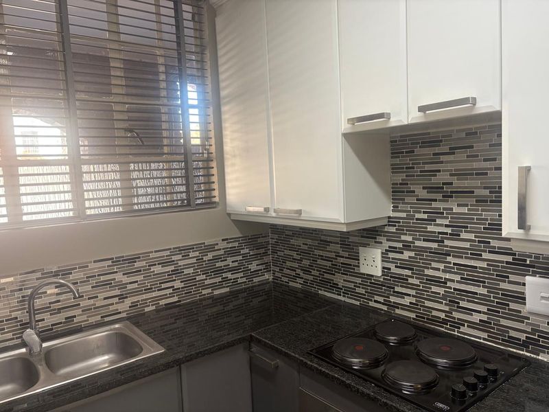 Modern Living Awaits: Stylishly Renovated, Ultra-Convenient Home - Photo 10