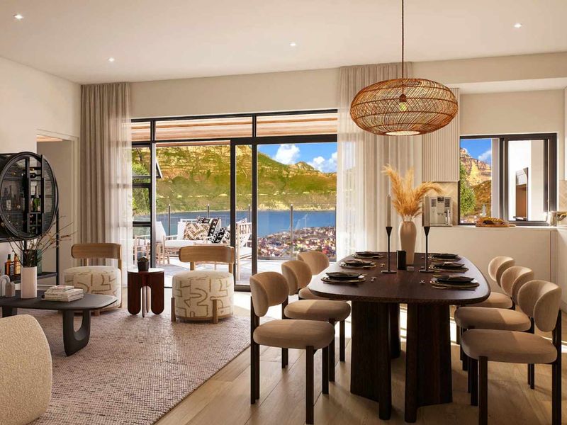 Modern open-plan living and dining area featuring hardwood floors, recessed lighting, and seamless access to a balcony with scenic mountain and water views.