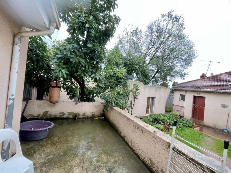 Triple Cottage Gem: Renovate, Invest, and Prosper! - Photo 8